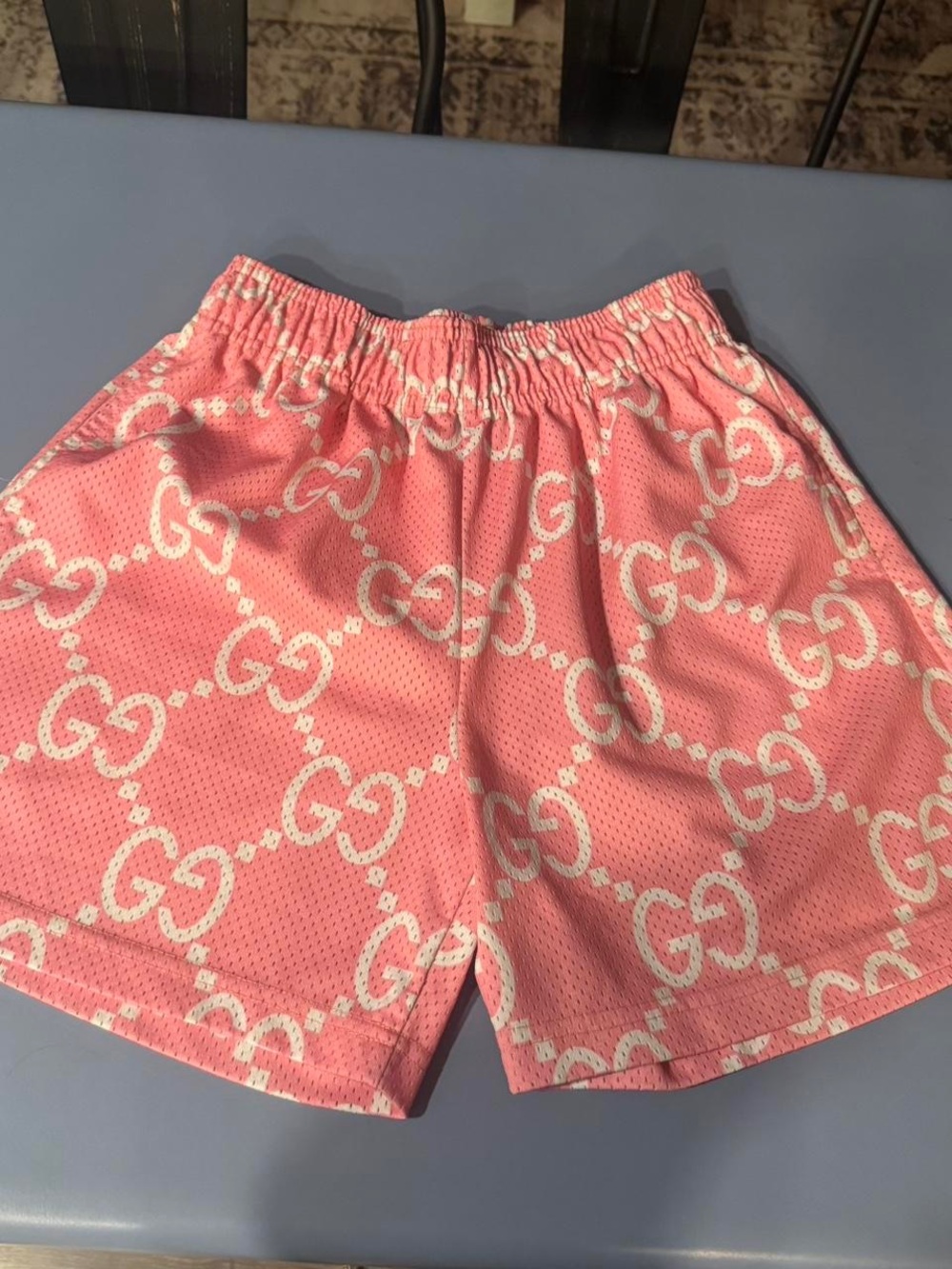 Bravest Studios Pink Athletic Shorts with White Logo Pattern